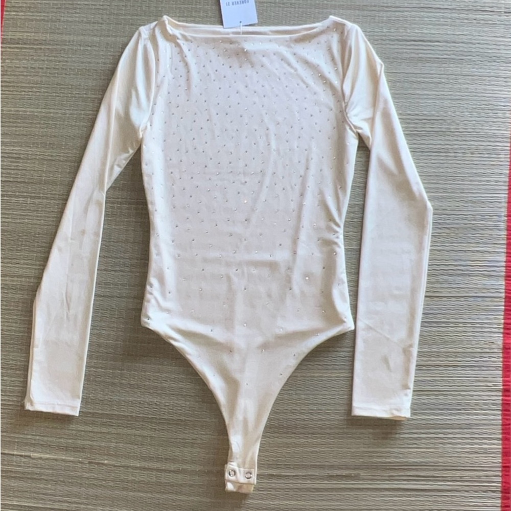 Forever 21 body suit cream color  Size XS